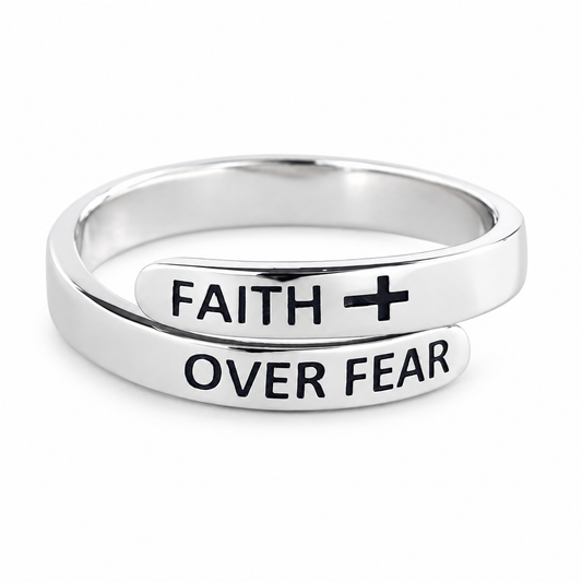Faith Over Fear ring in silver tone on a white background